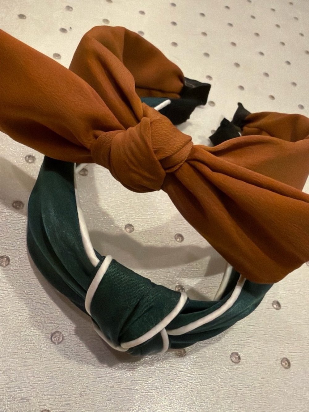 Stylish Rust Bow Headband with Emerald Knotted Accent